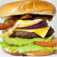 Miski Burger · beef patty with bacon, fried egg, onions guacamole, american cheese, lettuce, tomatoes and m...