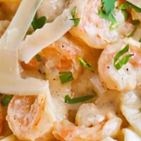 Seafood Fettuccine Alfredo · Sautéed shrimp,crabmeat and tomatoes in our Old Bay spiced creamy Alfredo sauce, served over...