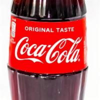  Coca-Cola Glass Bottles, 12 Fl Oz · 