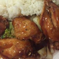 Teriyaki Chicken Wings · Served with rice. comes with miso soup and garden salad on the side.