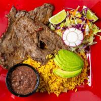 Carne Asada · Salvadorian style grilled steak served with, rice, refried beans, avocado and salad.