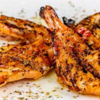 Grilled Shrimp · Wild-caught shrimp; marinated, butterflied, and grilled.