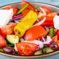 Side Greek Salad · Tomato, cucumber, red onion, green pepper, lettuce, kalamata olives, feta.