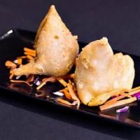 Vegetable Samosa · Two turnovers stuffed with mixed vegetables.
