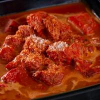Chicken Tikka Masala · Curry made with spices and cooked in a creamy sauce to a slightly sweet flavor.