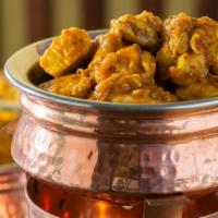 Vindaloo · A spicy dish served with sliced potatoes and cooked with a spicy blend of chilies, made slig...