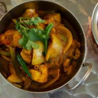 Jalfrazie · A thick curry cooked with tomatoes, green chilies, and perfected with a variety of herbs and...
