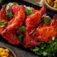 Chicken Tandoori Freshly Cooked 45 Minutes · Chicken on the bone, marinated in fresh yogurt and spices and finally grilled to perfection ...