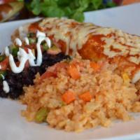 Camarones A La Diabla · Shrimp in spicy diabla sauce. Served with rice, choice of refried or black beans and tortill...