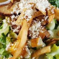 Mexican · Choice of crispy or grilled chicken, romaine lettuce, diced orange, cucumber, crispy tortill...