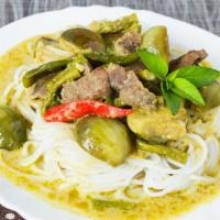 Noodles In Green Curry · Medium Spicy. Thin rice noodle, string bean, bamboo shoots, bell peppers and basil leaves in...
