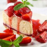 Homemade Strawberry Cheesecake · Creamy cheesecake with strawberries.
