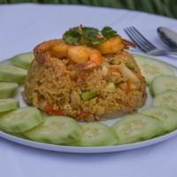 Thai Fried Rice · Thai style fried rice cooked with your choice of meat, egg, tomatoes, onion, and garlic in h...