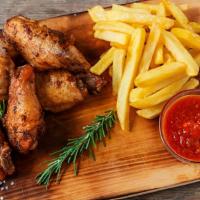 Chicken Wings With Fries · Deep-fried chicken wings served with your choice of sauce and a side of French Fries with Ke...
