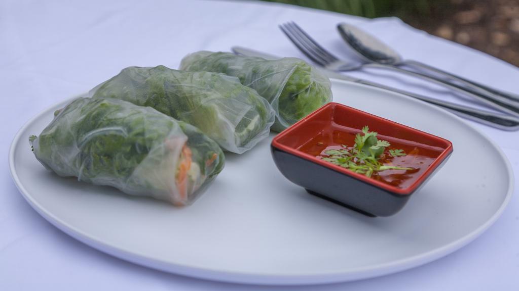 Fresh Summer Rolls · Fresh rice paper 2 rolls stuffed with mixed vegetables and your choice of protein (Chicken, Shrimp, or Tofu) or just Veggies, served with sweet and sour Thai chili sauce.