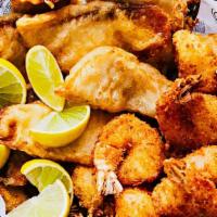 Fish And Shrimp Basket · 3 Fried Shrimps, 2 fillets of Crispy fried Tilapia or Flounder. served with your choice of s...