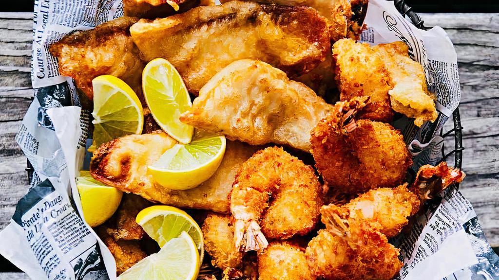 Fish And Shrimp Basket · 3 Fried Shrimps, 2 fillets of Crispy fried Tilapia or Flounder. served with your choice of sauce and a side of French fries with Ketchup.