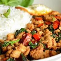 Sweet Basil Stir-Fry With Chicken · Spicy. Served with steamed rice.