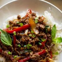 Sweet Basil Stir-Fry · Spicy. Served with steamed rice.