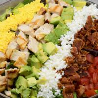 Chicken Cobb Salad · tossed mixed greens, blue cheese dressing, bacon, avocado, tomatoes + eggs