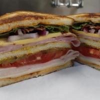 The Bobo · This Huge Club Sandwich is on Toasted Buttermilk bread, mustard, mayo, lettuce, tomato, pick...
