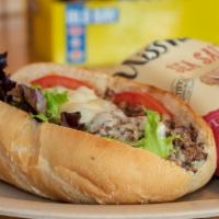 Cheesesteak · Chopped steak, grilled onions, your choice of fixings and provolone cheese.