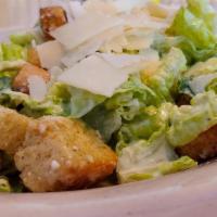 Caesar Salad · Romaine lettuce, croutons, and Parmesan.