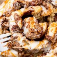 Pecan Caramel Roll · Cinnamon Roll topped with pecans and caramel