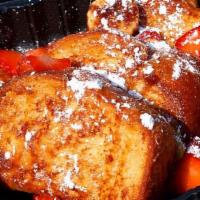 Apple French Toast · French Toast challah bread stufffed with our house made Apple mix garnished with strawberrie...