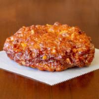 Apple Fritter · Dough mixed with chopped apples and honey glazed.