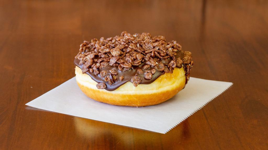 Chocolate Cocoa Pebble. · YEAST DONUT with frosted chocolate plus crunchy pebbles..