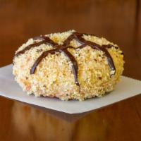 Cake Krunch · Honey glazed, toasted cake crumbs, and chocolate drizzles.