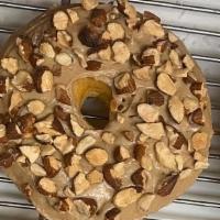 Maple Almonds  · Yeast raised donuts with maple flavor plus topping almonds…