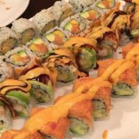 Spicy Girl Roll · Salmon, avocado, mango inside, top with spicy crabmeat, crunch, spicy mayo.
