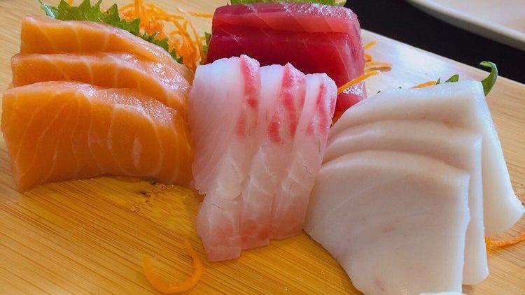 Sushi & Sashimi Combo · 5 pcs of sushi, 12 pcs of sashimi, 1 California roll.