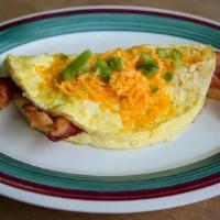 Omelette 3 Egg · Eggs,   Add your choice of Veggie, Cheese, &  Meat 