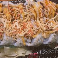 Superman Roll · Spicy crawfish, shrimp tempura, avocado inside, topped with deep fried crab, crunchy spicy m...