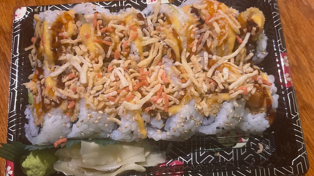 Superman Roll · Spicy crawfish, shrimp tempura, avocado inside, topped with deep fried crab, crunchy spicy mayo, eel sauce , sweet chili on top.
