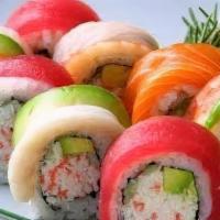 Rainbow Roll · Crab meat, avocado, cucumber, with tuna, salmon, white fish on top.