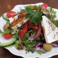 Greek Salad · Grilled chicken breast, romaine, feta cheese, red onions, tomatoes, cucumbers, and kalamata ...