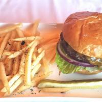 Classic Cheesburger · Cheddar, tomato, red onion, lettuce and pickles, served with fries.