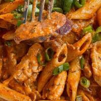 Pasta Jambalaya · Traditional new Orleans dish with chicken, andouille sausage and shrimp served on penne  pas...