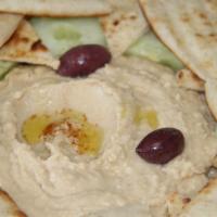Hummus Plate (Gf Option) · Hummus, olive oil, cucumbers, olives, pita bread (veg, df, v). (Gluten Free Option available)