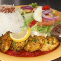 Chicken Kabob (Gf) · Chicken marinated and grilled served on marinara sauce with basmati rice & side salad (dairy...