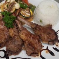 Grilled Lamb Chops (Gf) · Four new zealand lamb chops served with moroccan style grilled vegetable salad.