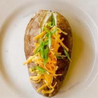 Baked Potato · Loaded up with cheddar cheese, sour. cream, chives & butter.