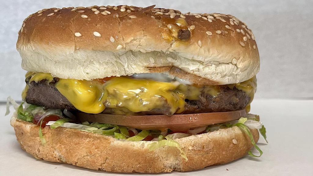 Cheese Burger · Beef pattie, American cheese, pickles, lettuce, tomato, onion, mayo and ketchup.