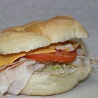 Turkey Breast Sandwich · Lettuce, Tomato, American Cheese, Mayo.