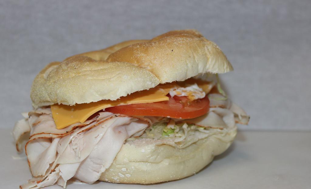 Turkey Breast Sandwich · Lettuce, Tomato, American Cheese, Mayo.