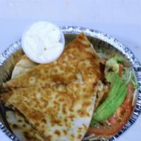 Chicken Quesadilla · Chicken, onions, peppers, mozzarella, and Cheddar cheese.